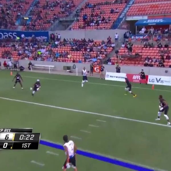 Flag football game with on-screen score graphics